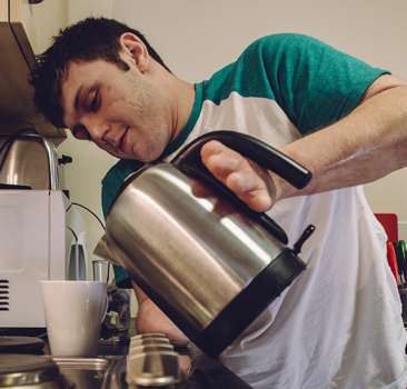 man using a kettle